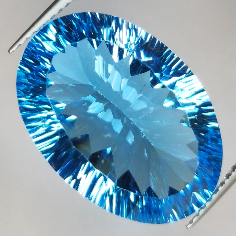 19.76 ct Blue Topaz Cut Oval Millenium 21 x 14.7 mm