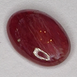 1.70ct Rubino Stella cabochon ovale 8x6mm