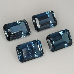 Topacio Londres azul talla esmeralda 6x4mm 4pz