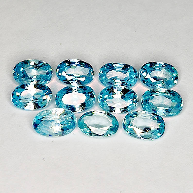 10.02ct Blue Zircon oval cut 6.2x4.0mm 14pc