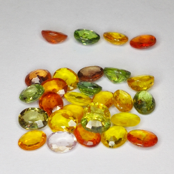 11.01ct Zafiro de Songea multicolor talla oval 5x4mm 28pz