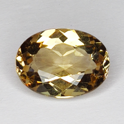 6.61ct Champagne Topaz taglio ovale 13.9x10.1mm