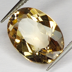 6.61ct Champagne Topaz oval cut 13.9x10.1mm