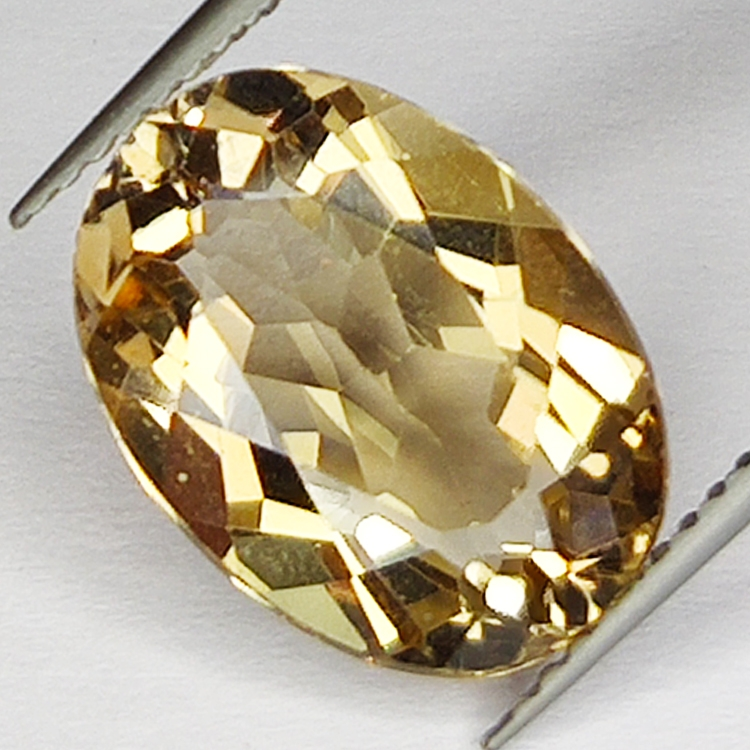 6.61ct Champagne Topaz oval cut 13.9x10.1mm