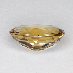 6.61ct Champagne Topaze coupe ovale 13.9x10.1mm