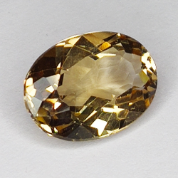 6.61ct Champagne Topaze coupe ovale 13.9x10.1mm