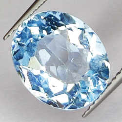 6.59ct Blue Topaz oval cut 12.0x10.2mm