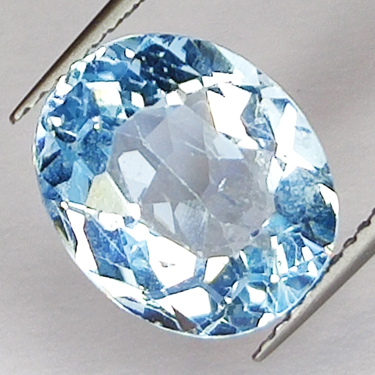 6.59ct Blue Topaz oval cut 12.0x10.2mm