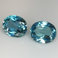 Topaze bleue de Londres taille ovale 11x9mm 1pz