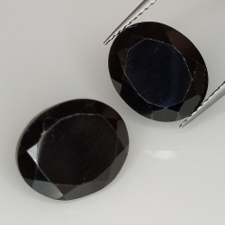 Black spinel oval cut 12x10mm 1pz