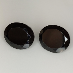 Black spinel oval cut 12x10mm 1pz