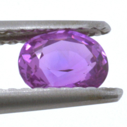 0,79 ct rosa Saphir im Ovalschliff 5,79 x 4,77 mm