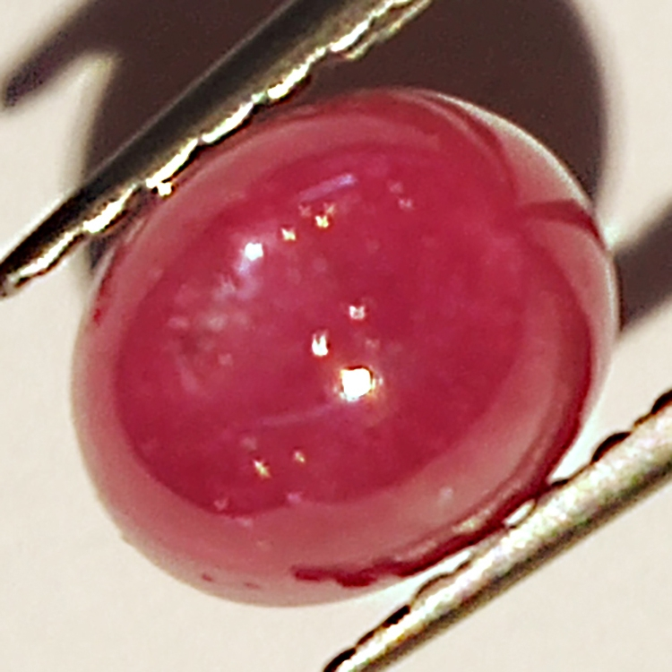 2.98ct Rubino Stella cabochon ovale 6.4x5.4mm