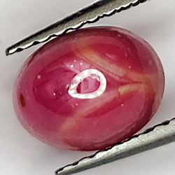 2.39ct Rubino Stella cabochon ovale 7.2x5.7mm