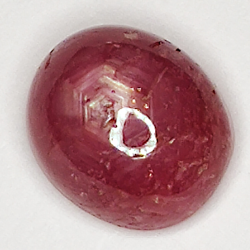 2.58ct Rubin Stern cabochon oval 7.9x6.6mm