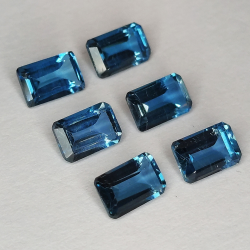 Topacio Londres azul talla esmeralda 6x4mm 4pz