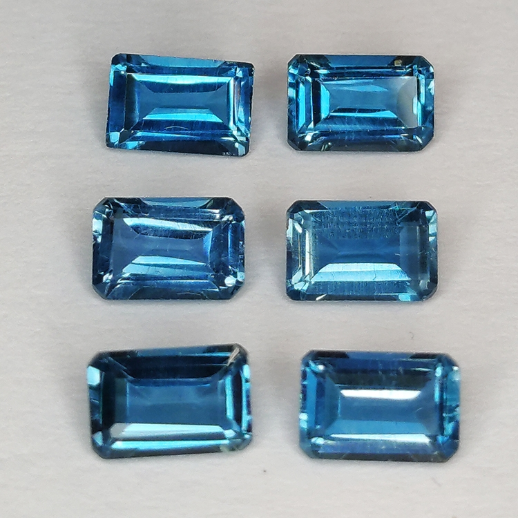 Topaze bleue de Londres taille émeraude 6x4mm 6pz