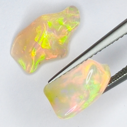 3,48 ct Rough Ethiopian Opal 10,97 x 7,02 x 5,45 und 12,51 x 7,47 x 5,59 mm und 12,63 x 5,45 x 4,43 mm