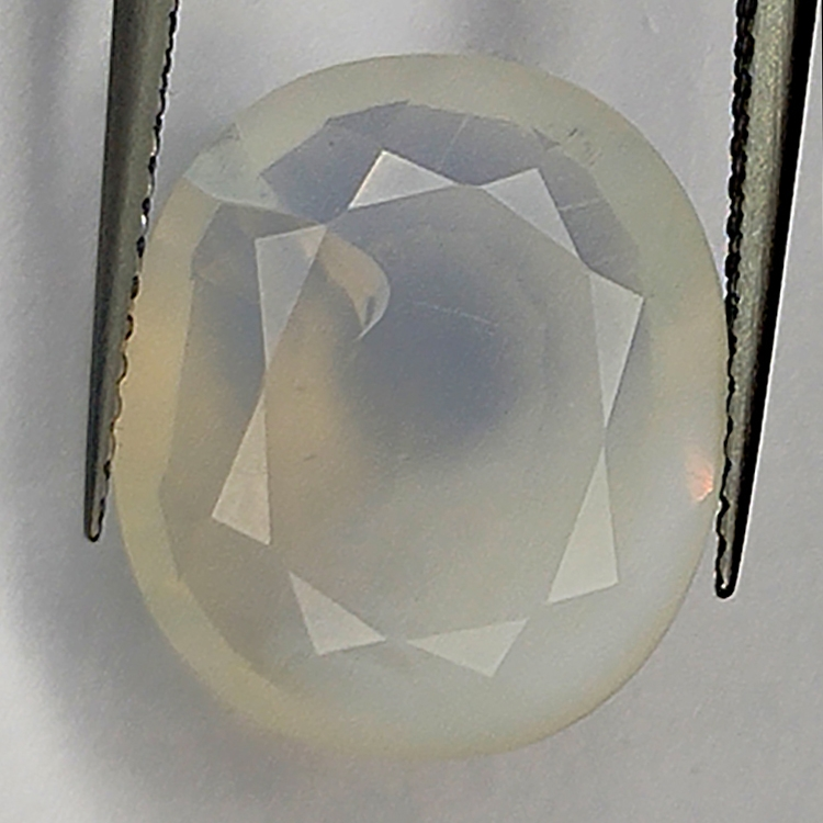 5.95ct White Opal oval cut 15.0x12.9mm