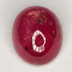 2.44ct Rubin Stern cabochon oval 7.8x6.6mm