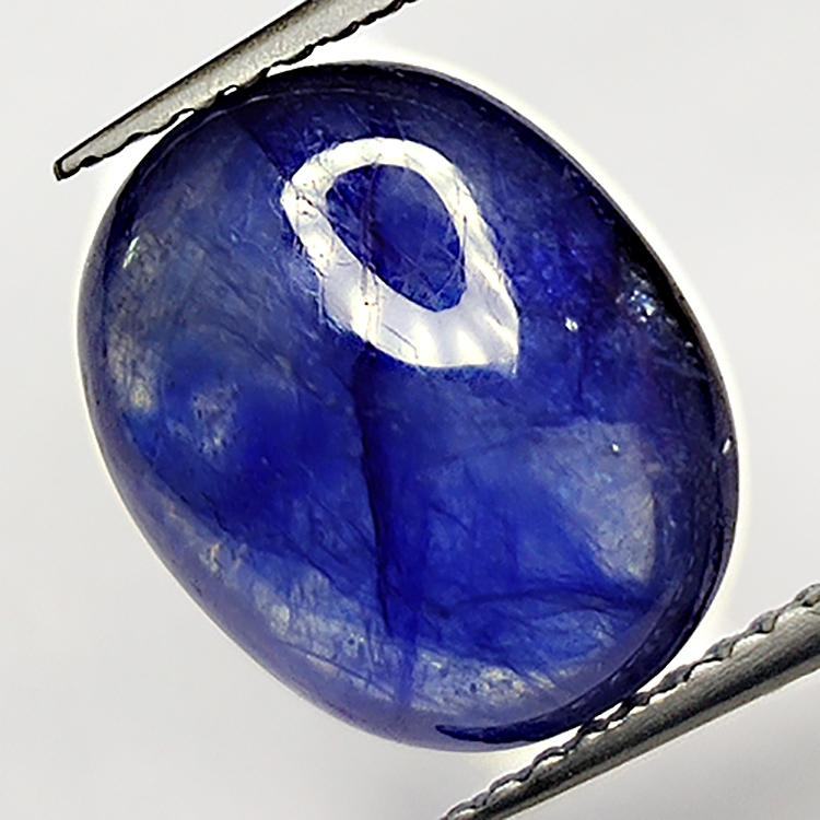 6.33ct Zaffiro Blu cabochon ovale 12.1x9.6mm