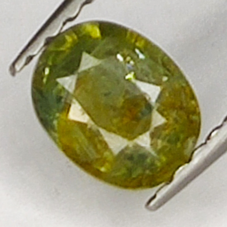 0.64ct Green Sapphire oval cut 5.8x4.6mm