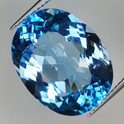 19.41ct Topaze Bleue coupe ovale 18.5x14.4mm