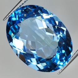 18.44ct Topaze Bleue coupe ovale 19.1x14.5mm