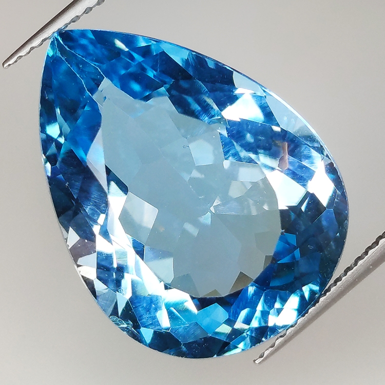 22.67ct Blue Topaz pear cut 21.3x15.8mm