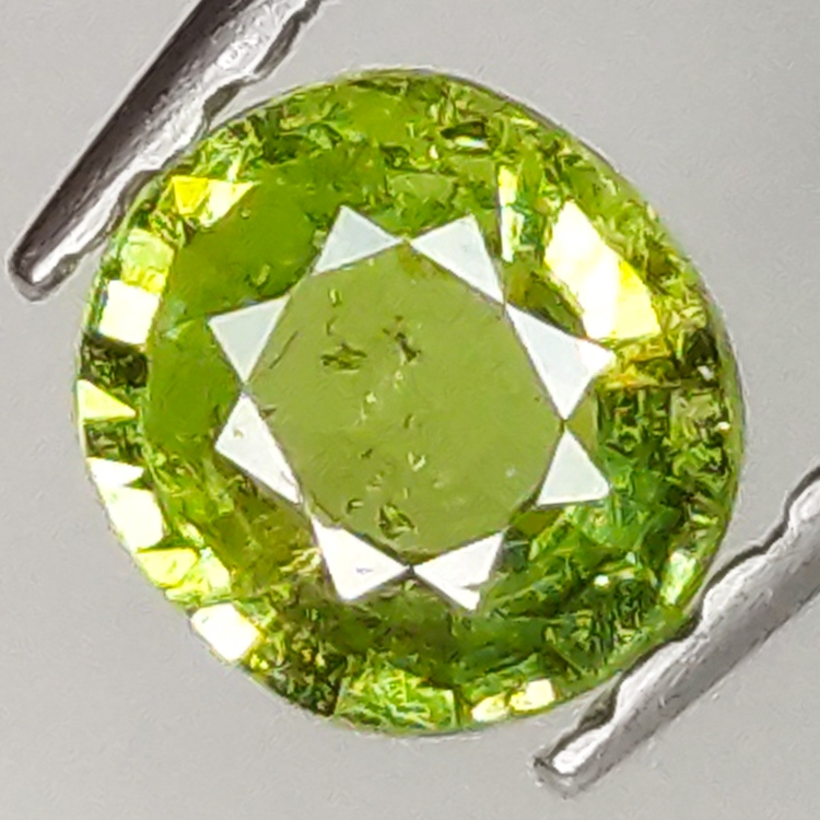 0.40ct Demantoid Garnet oval cut 4.8x4.4mm