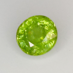 0.58ct Demantoid Garnet oval cut 4.9x4.6mm