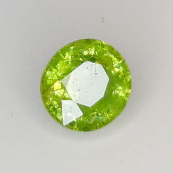 0.58ct Demantoid-Granat ovalerschliff 4.9x4.6mm