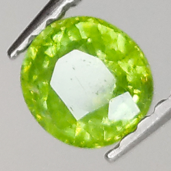 0.58ct Demantoid Garnet oval cut 4.9x4.6mm