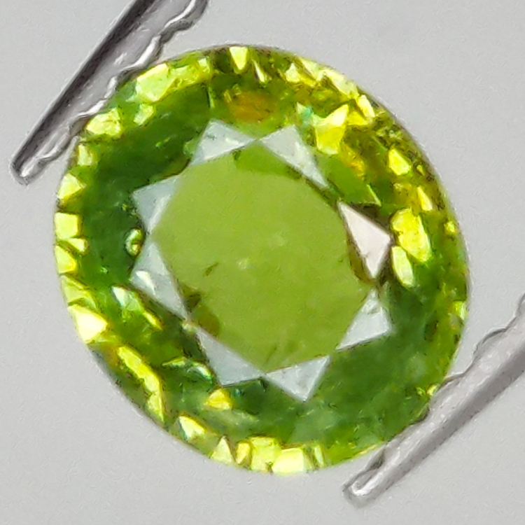 0.74ct Demantoid Garnet oval cut 5.9x5.2mm