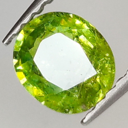 0.77ct Demantoid Garnet oval cut 6.0x5.2mm