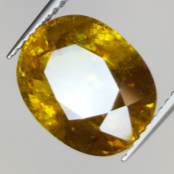 7.43ct Green Sphene oval cut 12.9x10.1mm