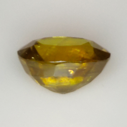 7.43ct Sphène Verte coupe ovale 12.9x10.1mm