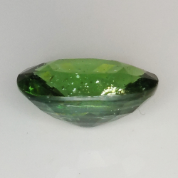 5.18ct Apatite verde taglio ovale 12.9x9.7mm