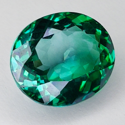 10.24ct Grüner Topas ovalschliff 14.2x12.3mm