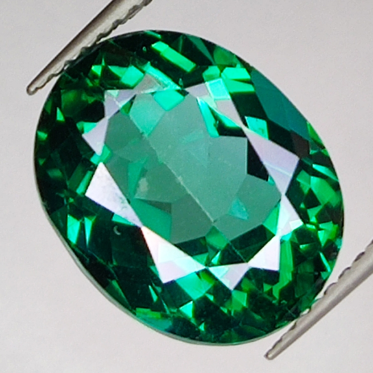 8.51ct Topacio Verde talla oval 13.1x10.5mm