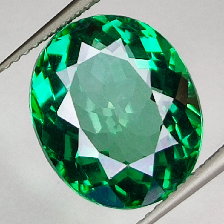 9.81ct Grüner Topas ovalschliff 14.0x11.9mm