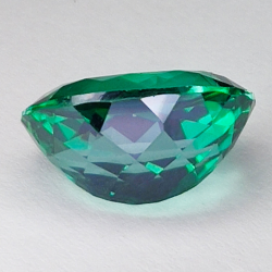 13.29ct Topaze Verte ovale coupe 16.1x12.2mm