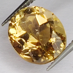 6.67ct Champagne Topaz oval cut 12.1x10.1mm