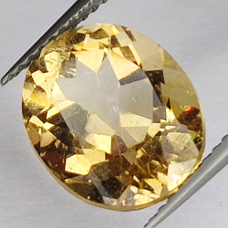 6.67ct Champagne Topaz oval cut 12.1x10.1mm