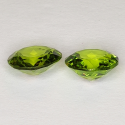 3.06ct Coppia Peridot taglio rotondo 7.8x7.7mm