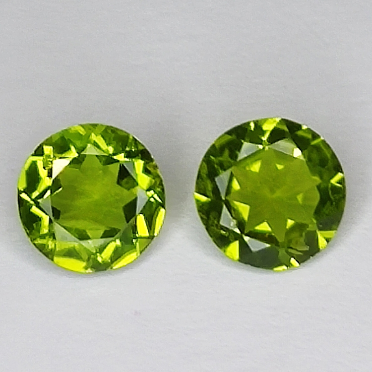 3.06ct Coppia Peridot taglio rotondo 7.8x7.7mm