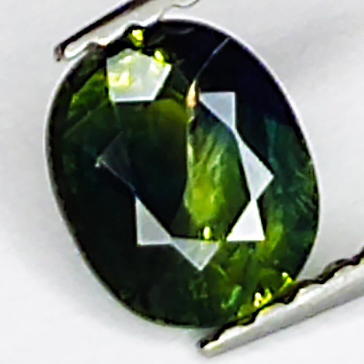 0.77ct Zaffiro Verde taglio ovale 6.0x5.0mm