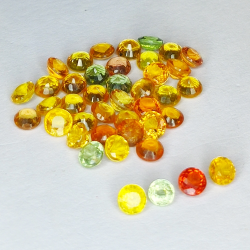 7.05ct Zafiro de Songea multicolor talla redonda 3.2x3.1mm 41pz