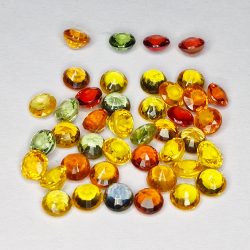 7.42ct Zafiro de Songea multicolor talla redonda 3.1x3.1mm 42pz