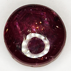 5.39ct Rubino Stella cabochon ovale 9.1x8.9mm